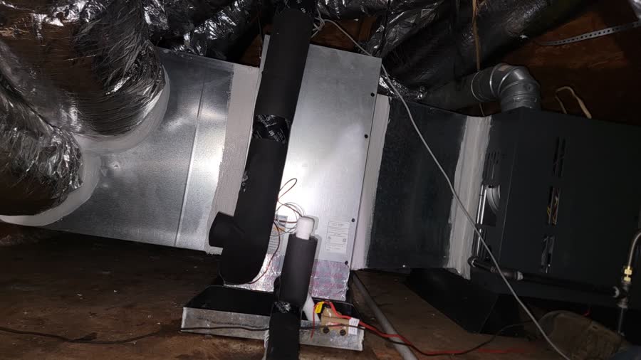 Air handler with new insulated refrigerant lines in an attic